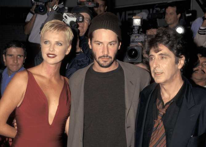 The star-studded cast of 'Devil's Advocate' celebrates at the premiere