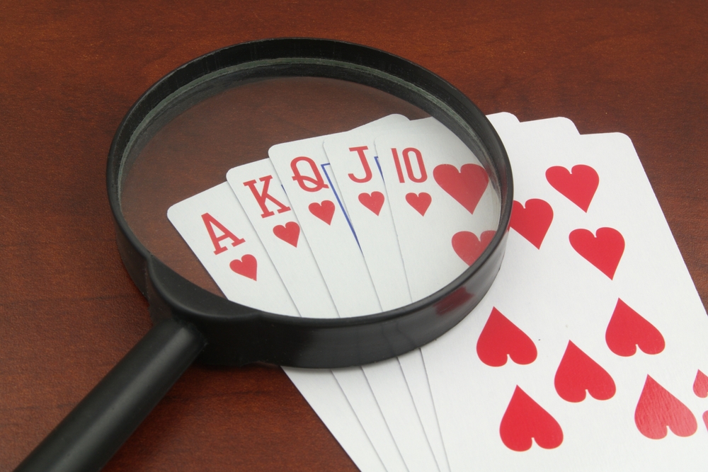 Hearts royal flush and an investigative lens